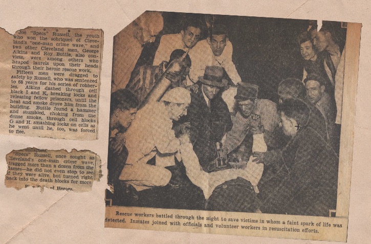 Newspaper articles including photo of fire victims being tended to
