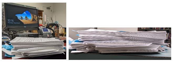Photos of a stack of completed in-library use surveys from 2022