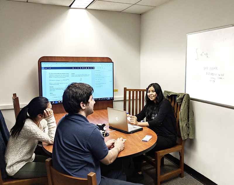 Students sitting at group study table