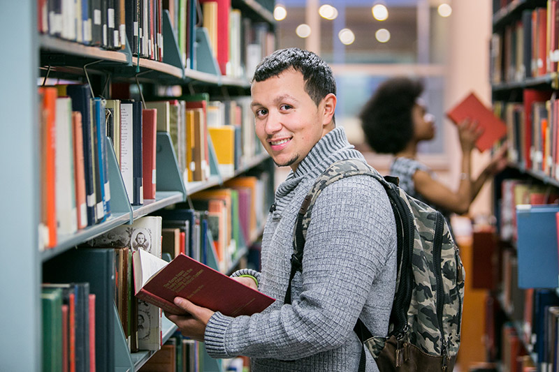 Student browsing books