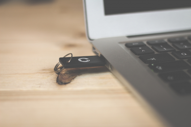 USB thumb drive inserted into a laptop